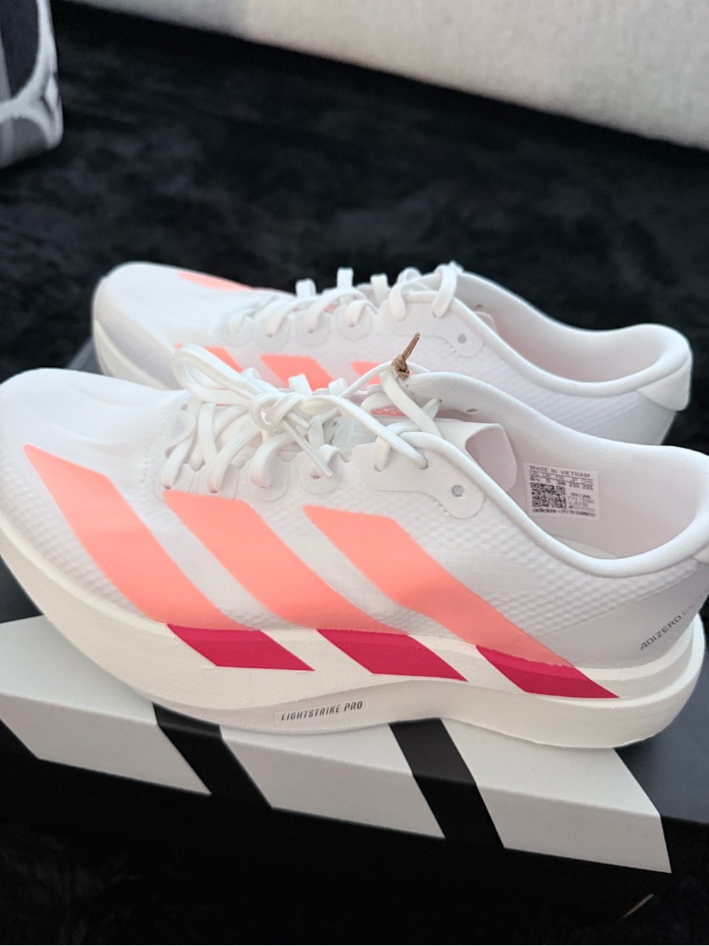 Adidas Adizero Evo SL White Running Shoes, red and orange accents. Size 6.5
